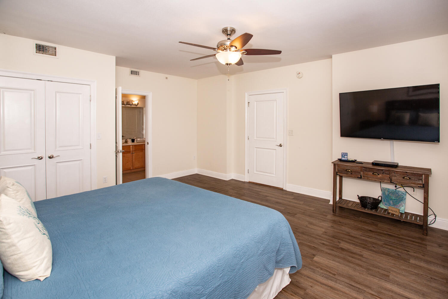 43 Cassine Way, Unit 402 Santa Rosa Beach, FL 32459 - Photo 8 of 52 a bedroom with a bed and a flat screen tv