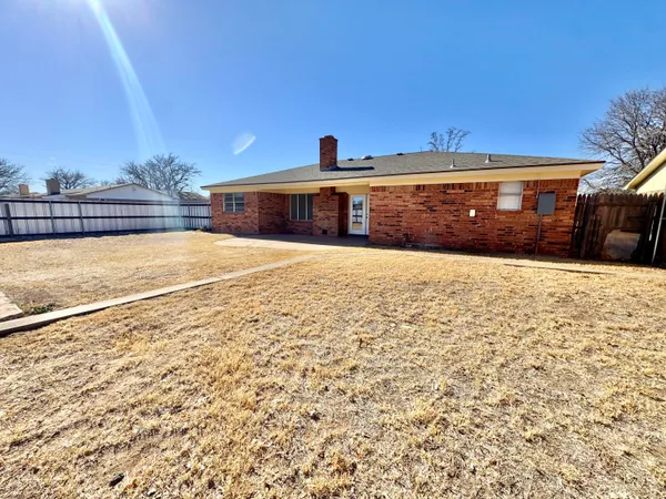 a bathroom with a tub and a sink