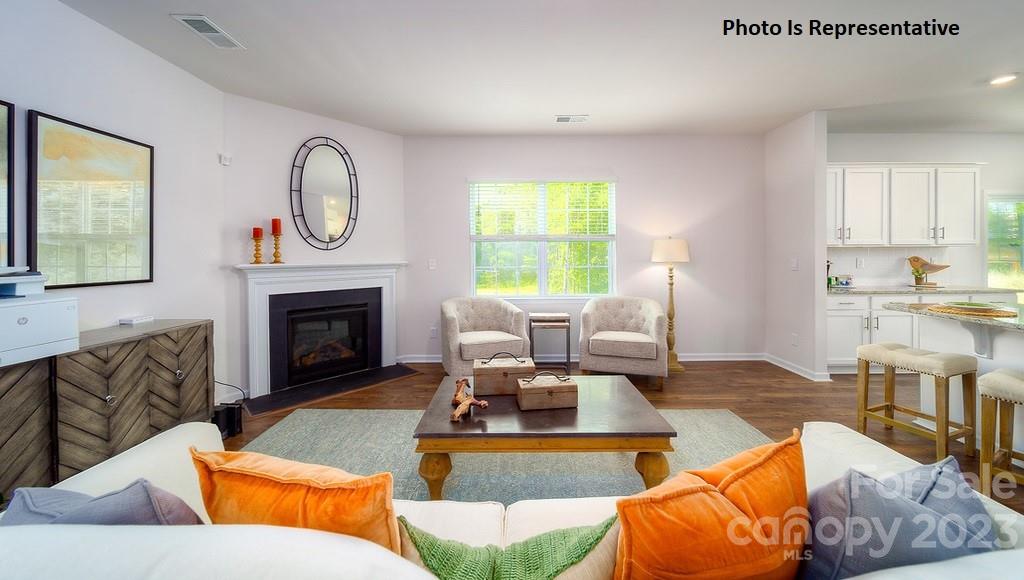 2116 Vanderlyn Street Monroe, NC 28112 - Photo 3 of 14 a living room with furniture fireplace and window