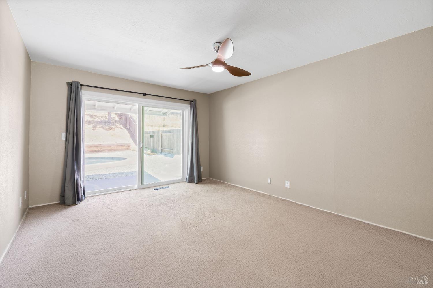 414 Brunswick Drive Vallejo, CA 94591 - Photo 23 of 73 a view of an empty room with a window