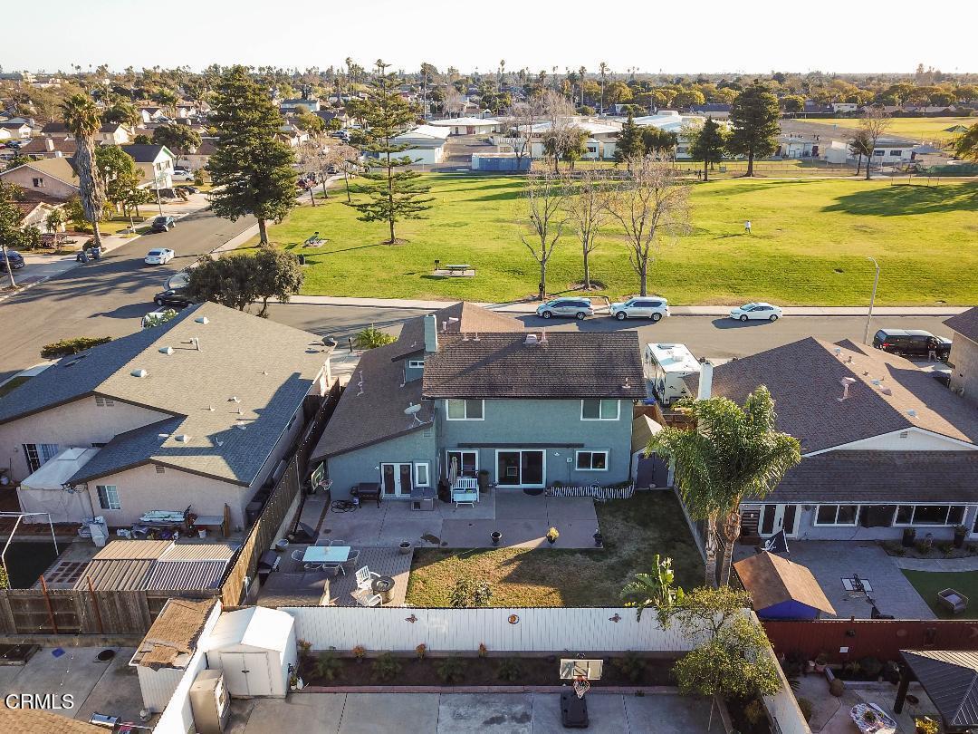 911 Indigo Place Oxnard, CA 93036 - Photo 30 of 30 an aerial view of a house with a swimming pool outdoor seating and yard