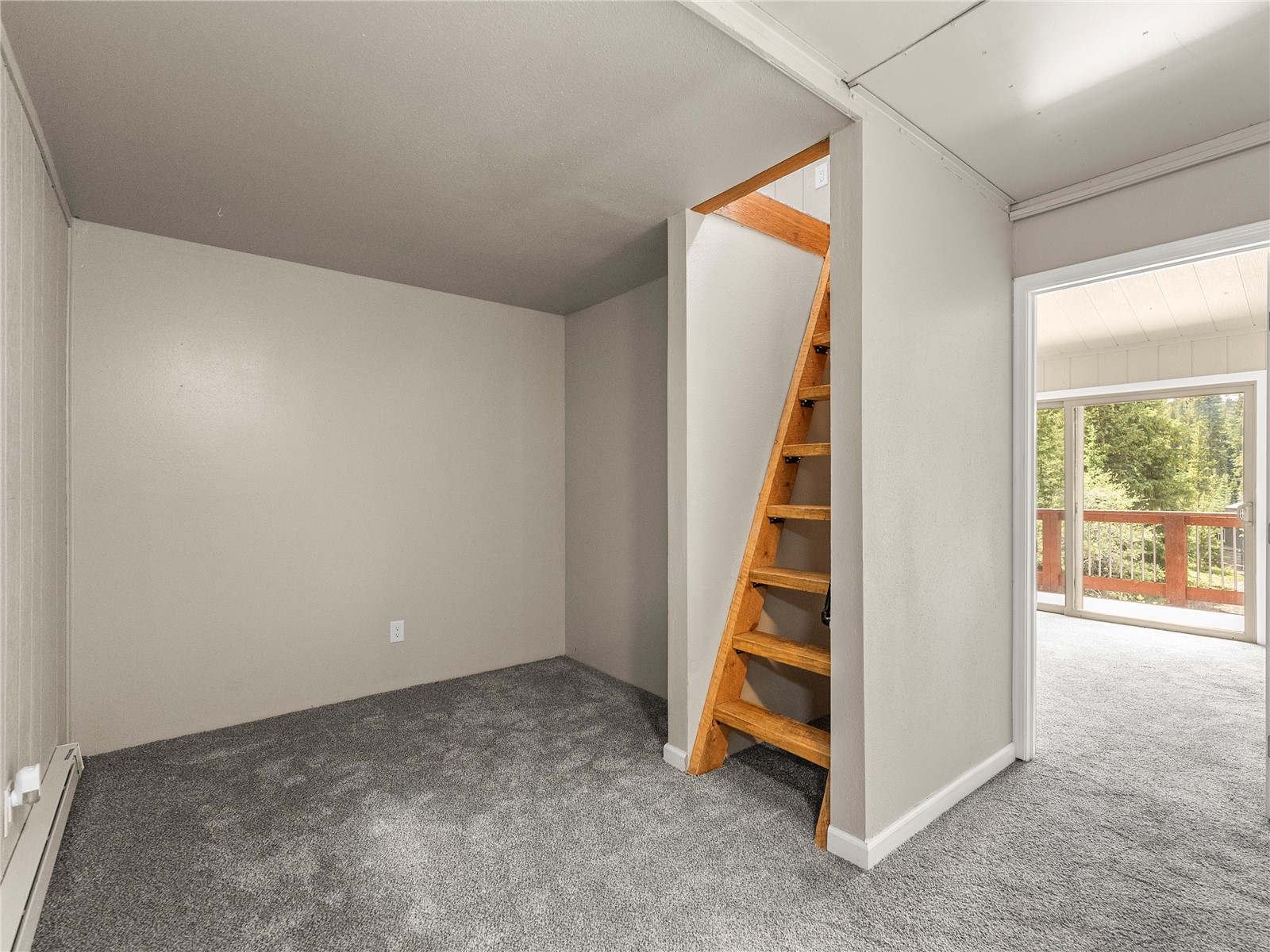 201 Bunker Hill Lode Road, Unit 6 Breckenridge, CO 80424 - Photo 17 of 20 wooden view of an empty room and stairs