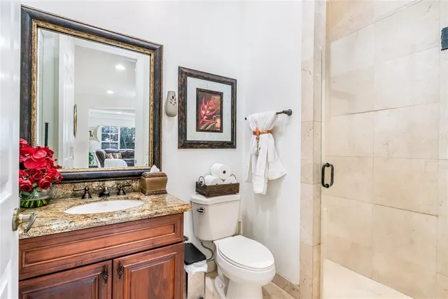 a kitchen with stainless steel appliances granite countertop a stove microwave and cabinets