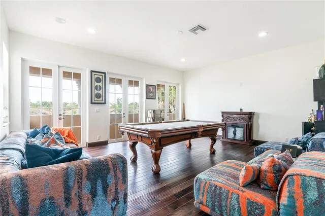 a room with furniture and wooden floor