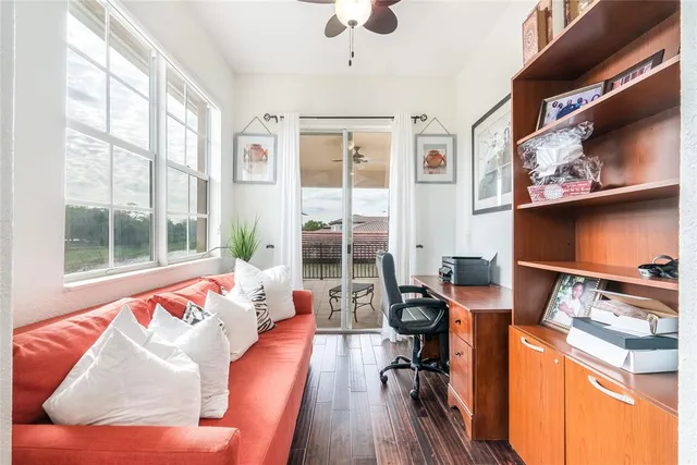 a spacious bathroom with a tub sink and mirror