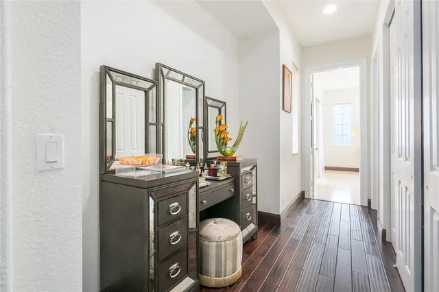 a view of a chairs and table in a balcony
