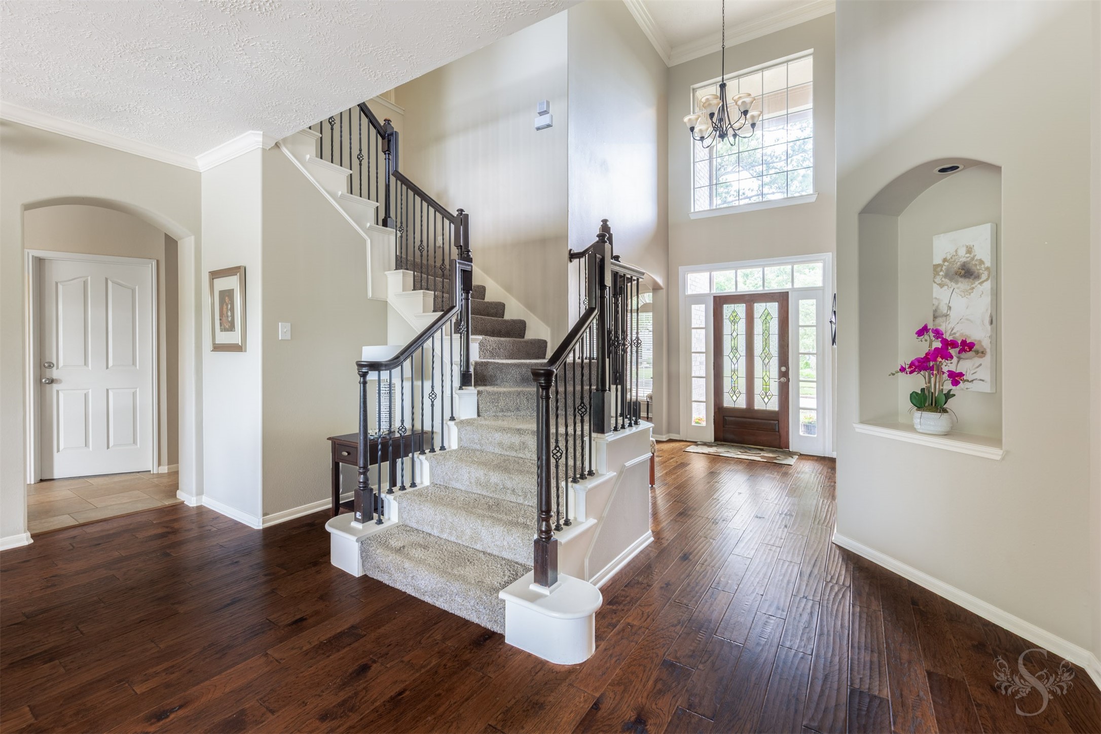 20410 Lake Spring Court Cypress, TX 77433 - Photo 11 of 50 a view of entryway and hall with wooden floor