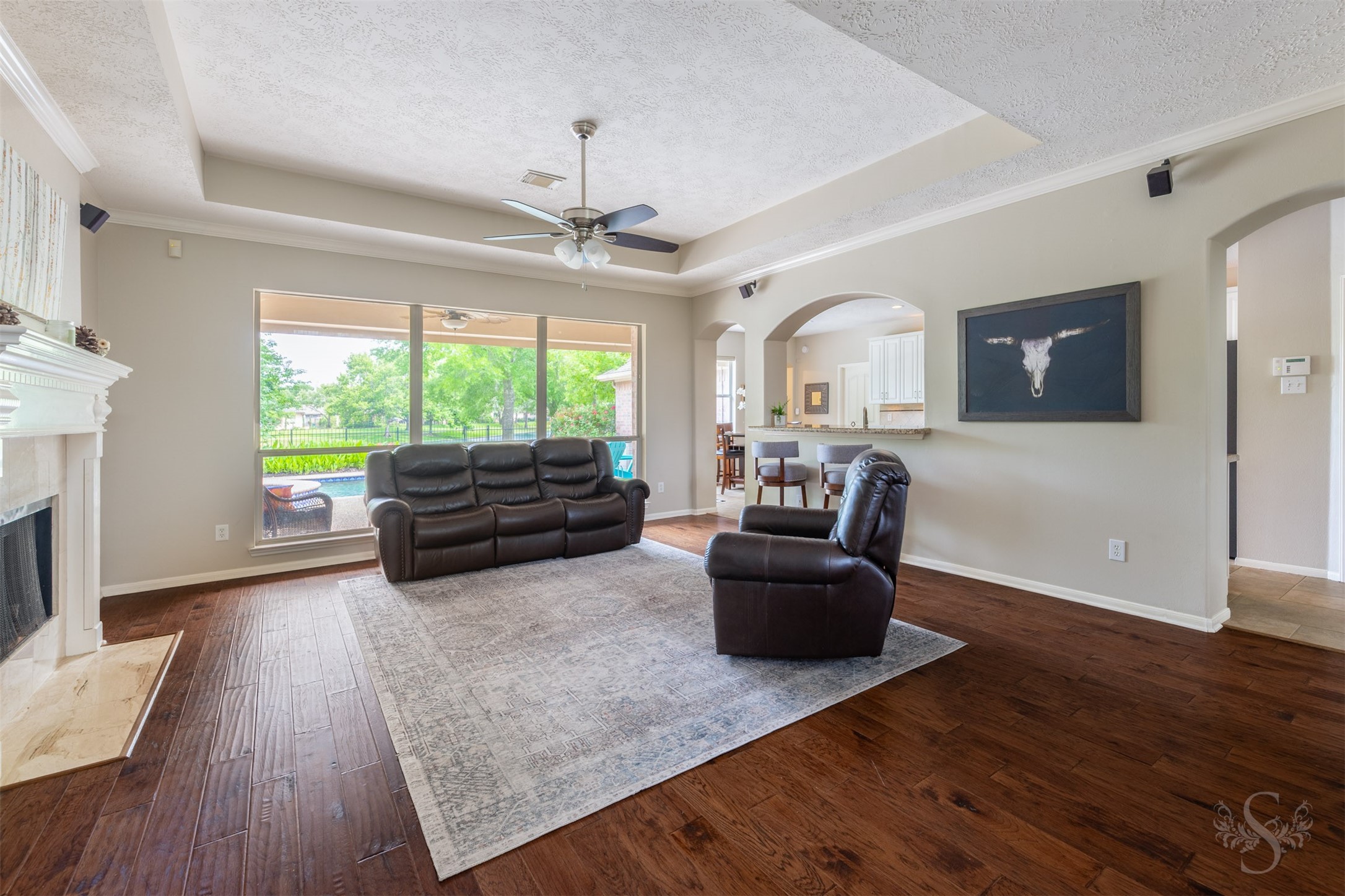 20410 Lake Spring Court Cypress, TX 77433 - Photo 15 of 50 a living room with furniture and a flat screen tv