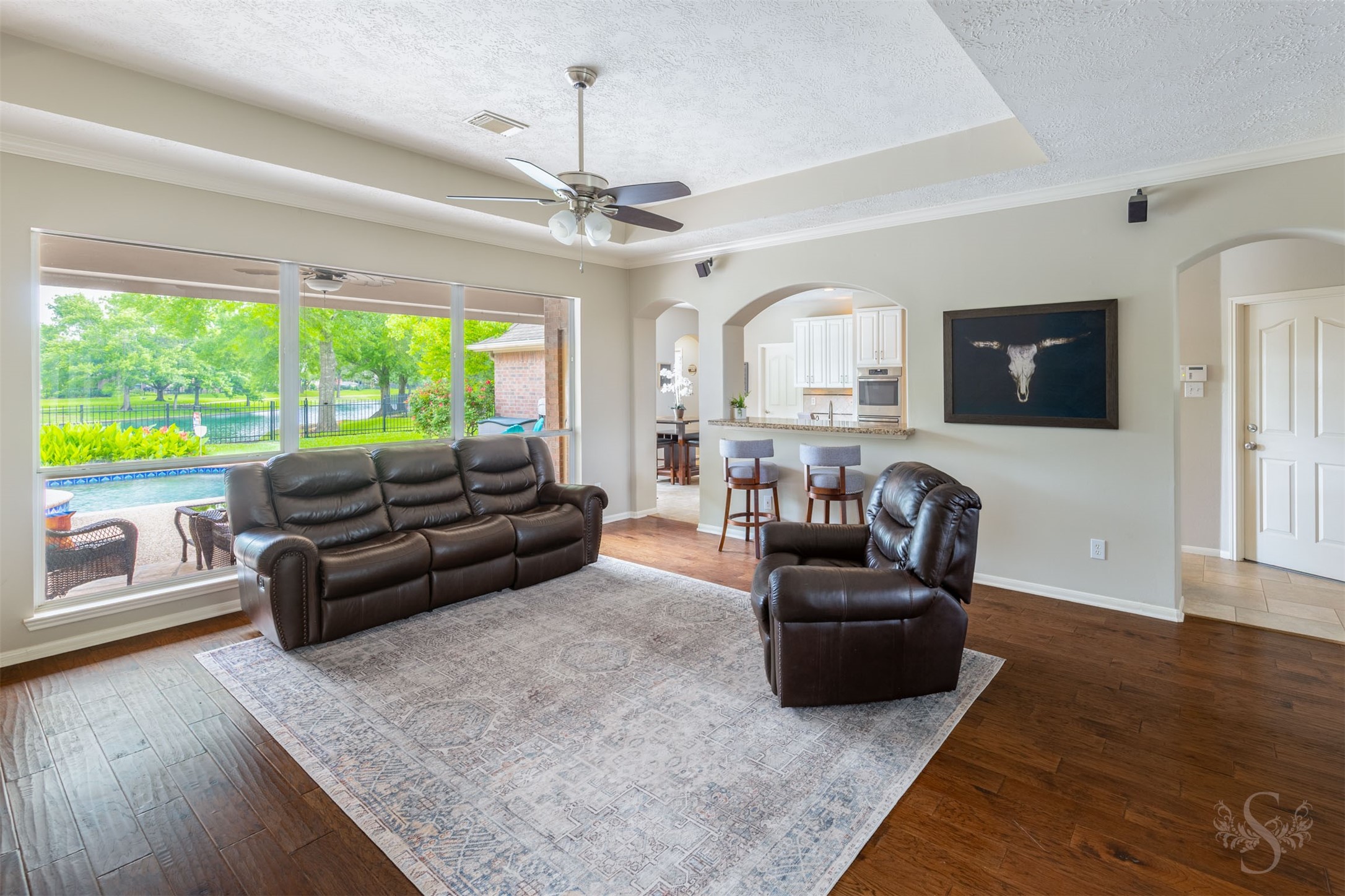 20410 Lake Spring Court Cypress, TX 77433 - Photo 16 of 50 a living room with furniture and a flat screen tv