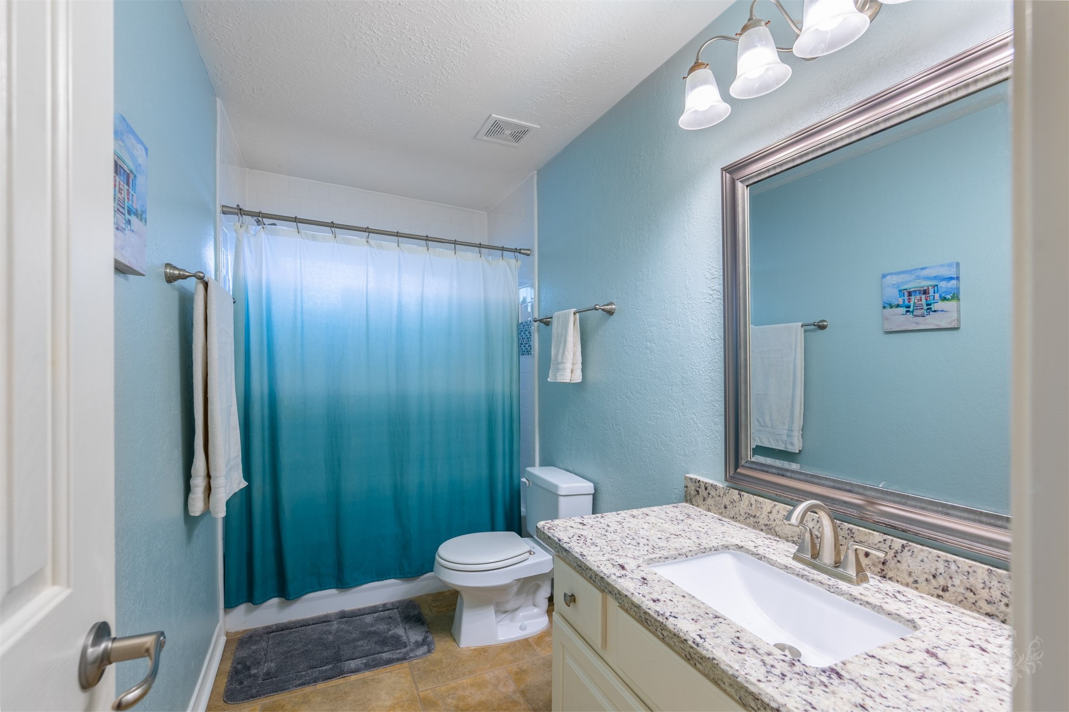 20410 Lake Spring Court Cypress, TX 77433 - Photo 27 of 50 a bathroom with a granite countertop sink toilet and shower