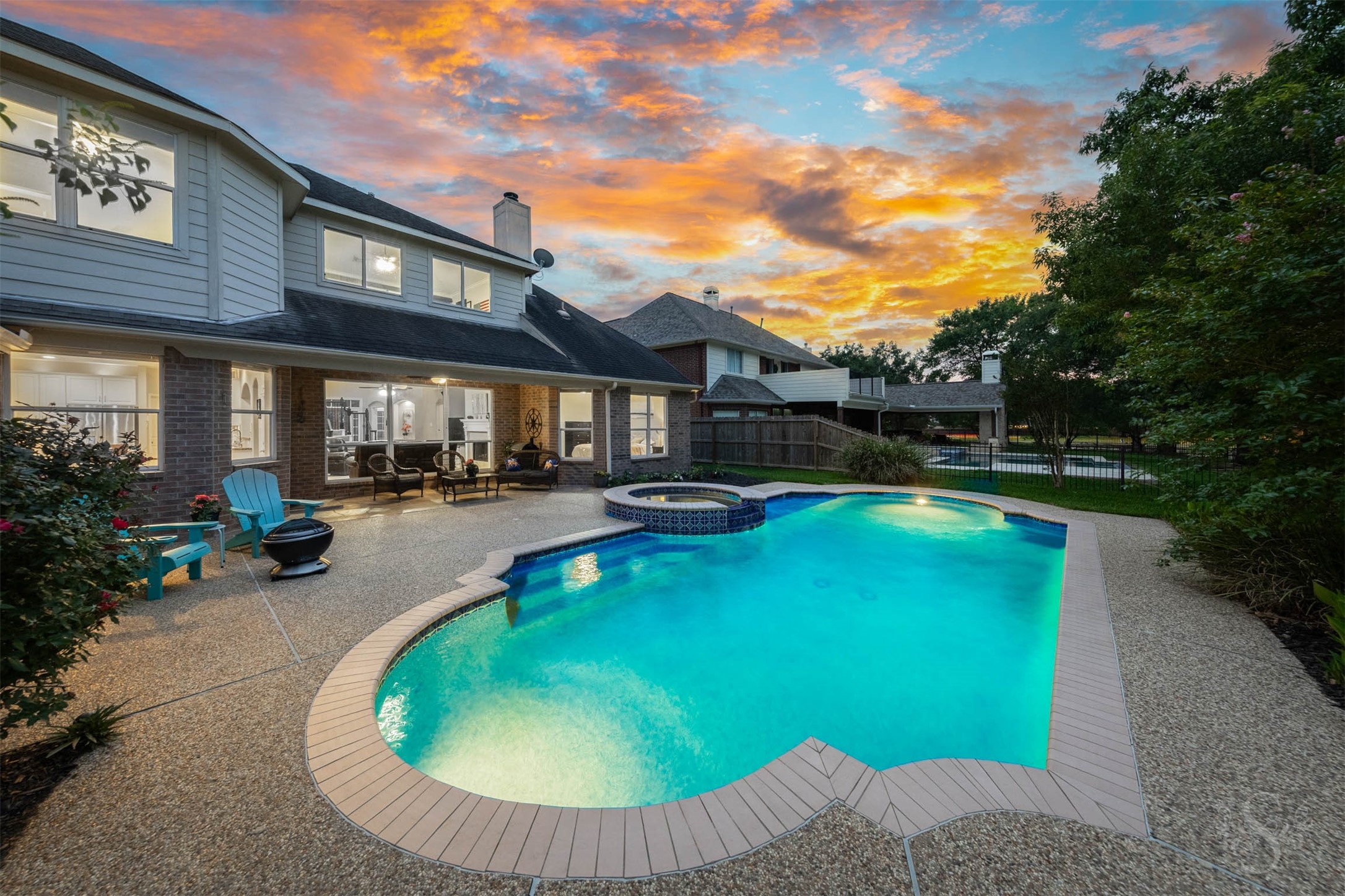 20410 Lake Spring Court Cypress, TX 77433 - Photo 48 of 50 a swimming pool with outdoor seating yard and barbeque oven
