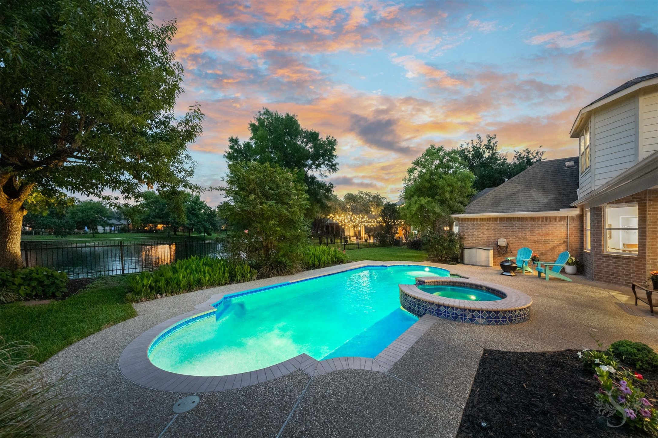 20410 Lake Spring Court Cypress, TX 77433 - Photo 49 of 50 a view of swimming pool with outdoor seating and yard