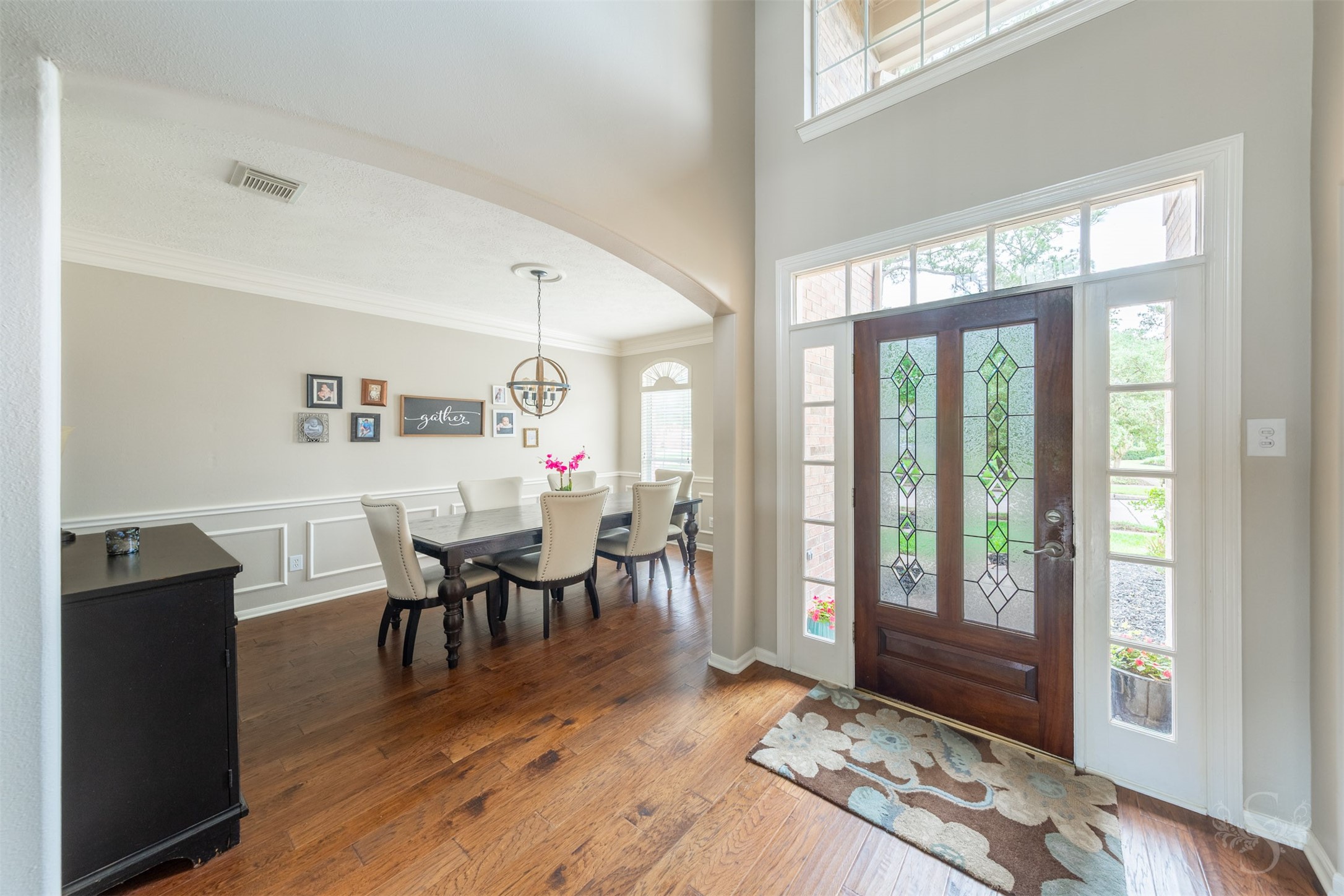 20410 Lake Spring Court Cypress, TX 77433 - Photo 6 of 50 a view of a dining room with furniture and wooden floor