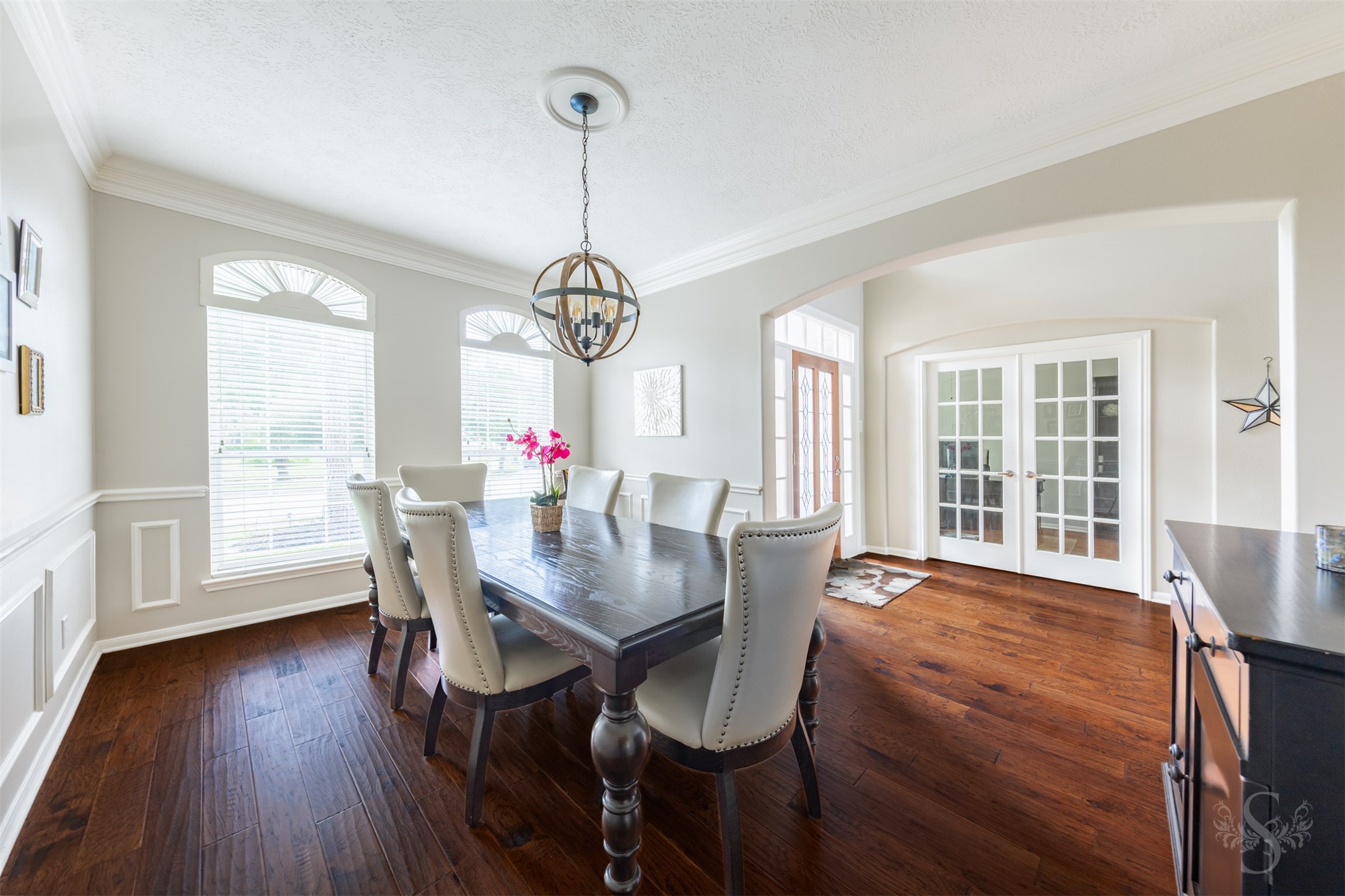 20410 Lake Spring Court Cypress, TX 77433 - Photo 9 of 50 a view of a dining room with furniture window and wooden floor