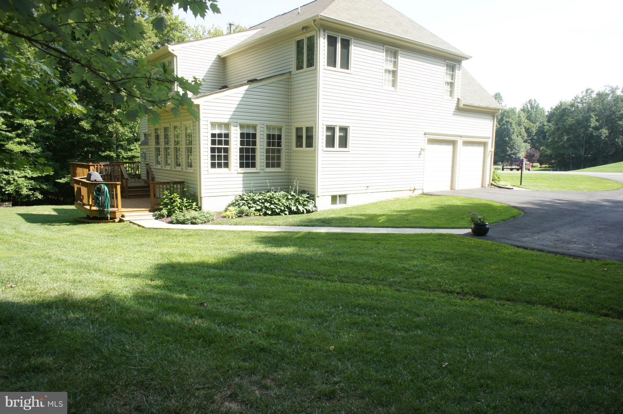 10871 Meanderview Court Manassas, VA 20111 - Photo 29 of 30 Side-load garage w/ paved driveway