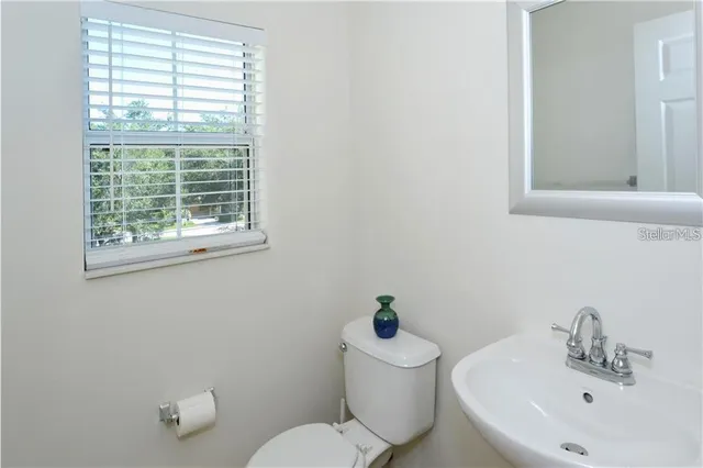 a bathroom with a sink and a toilet