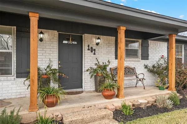 a view of a entryway door front of house