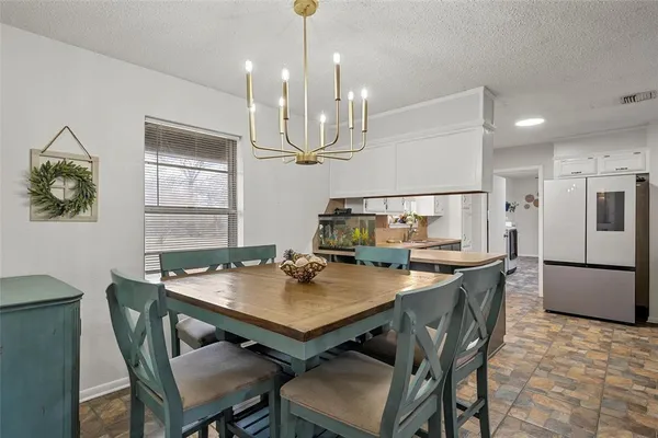 a view of a dining room with furniture