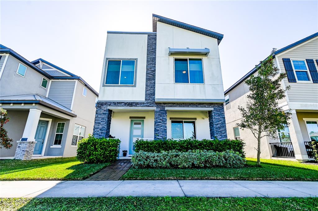 a front view of a multi story residential apartment building
