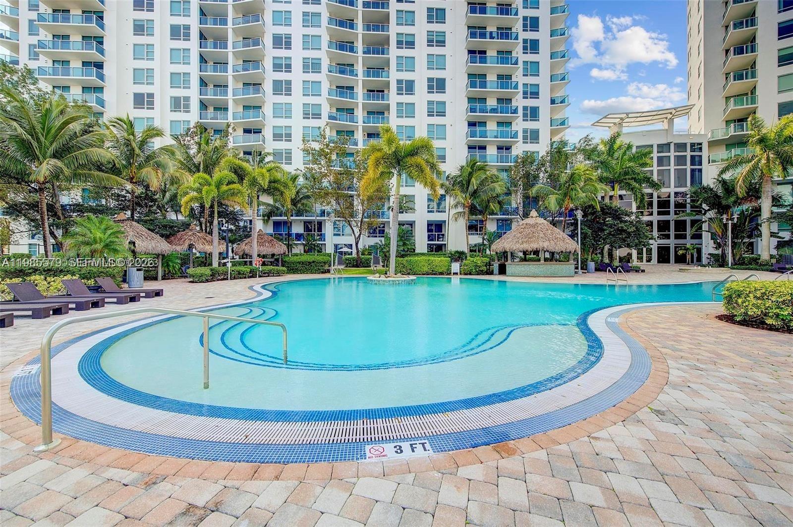 2681 North Flamingo Road, Unit 1201S Sunrise, FL 33323 - Photo 21 of 28 a view of swimming pool from a outdoor space