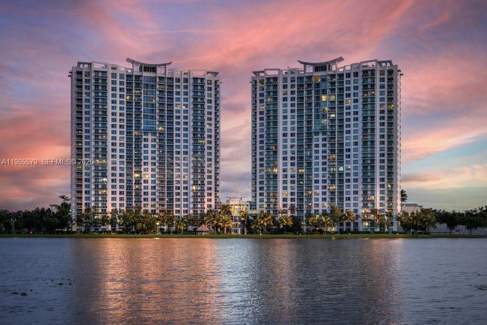 2681 North Flamingo Road, Unit 1201S Sunrise, FL 33323 - Photo 25 of 28 a view of a city with tall buildings and a lake