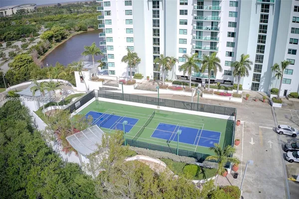a view of swimming pool with outdoor seating
