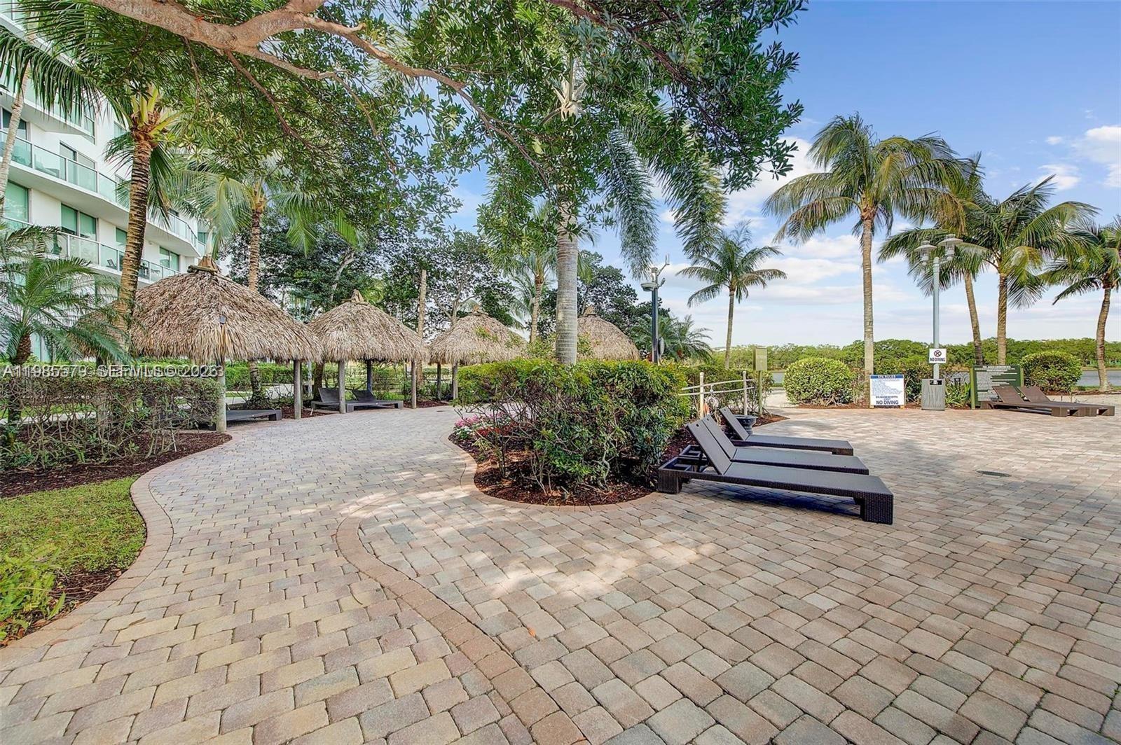 2681 North Flamingo Road, Unit 1201S Sunrise, FL 33323 - Photo 28 of 28 a view of outdoor space with garden view