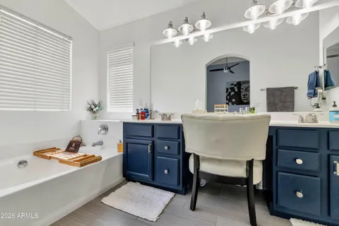 a room with a table chairs and a couch