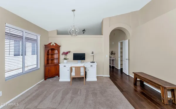 a view of livingroom with furniture and window