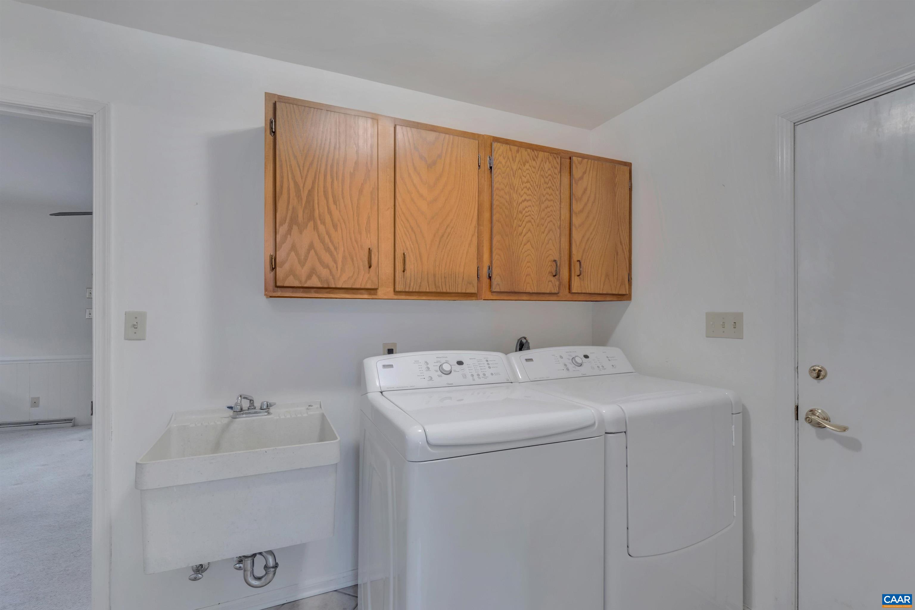 2091 Whippoorwill Road Charlottesville, VA 22901 - Photo 17 of 41 a utility room with dryer and washer