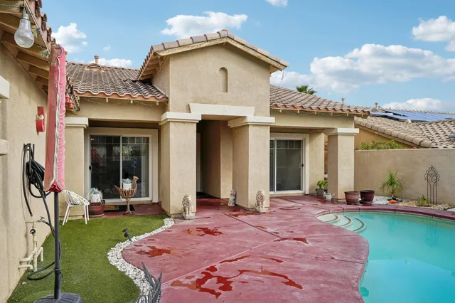 a outdoor living space with furniture and garden view