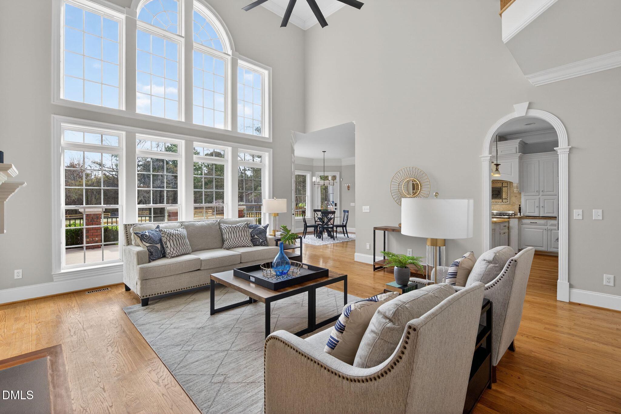 1609 Holland Road Fuquay-Varina, NC 27526 - Photo 13 of 79 a living room with furniture and wooden floor