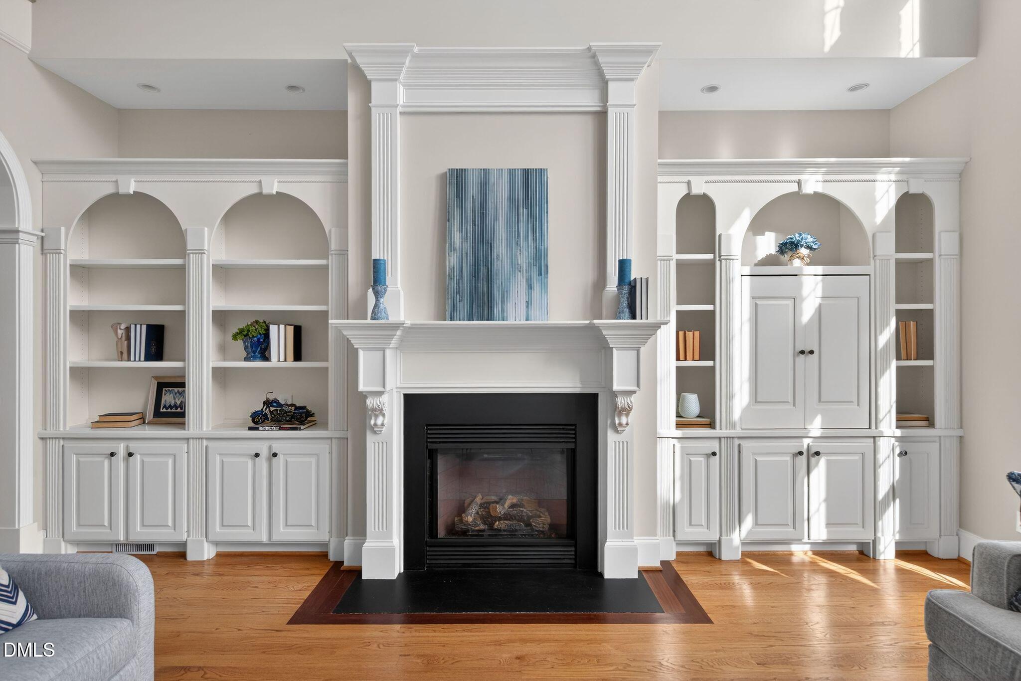 1609 Holland Road Fuquay-Varina, NC 27526 - Photo 14 of 79 a living room with furniture fireplace and wooden floor
