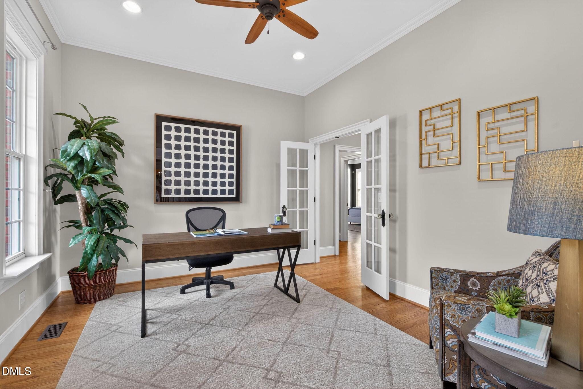 1609 Holland Road Fuquay-Varina, NC 27526 - Photo 23 of 79 a work room with furniture and a potted plant