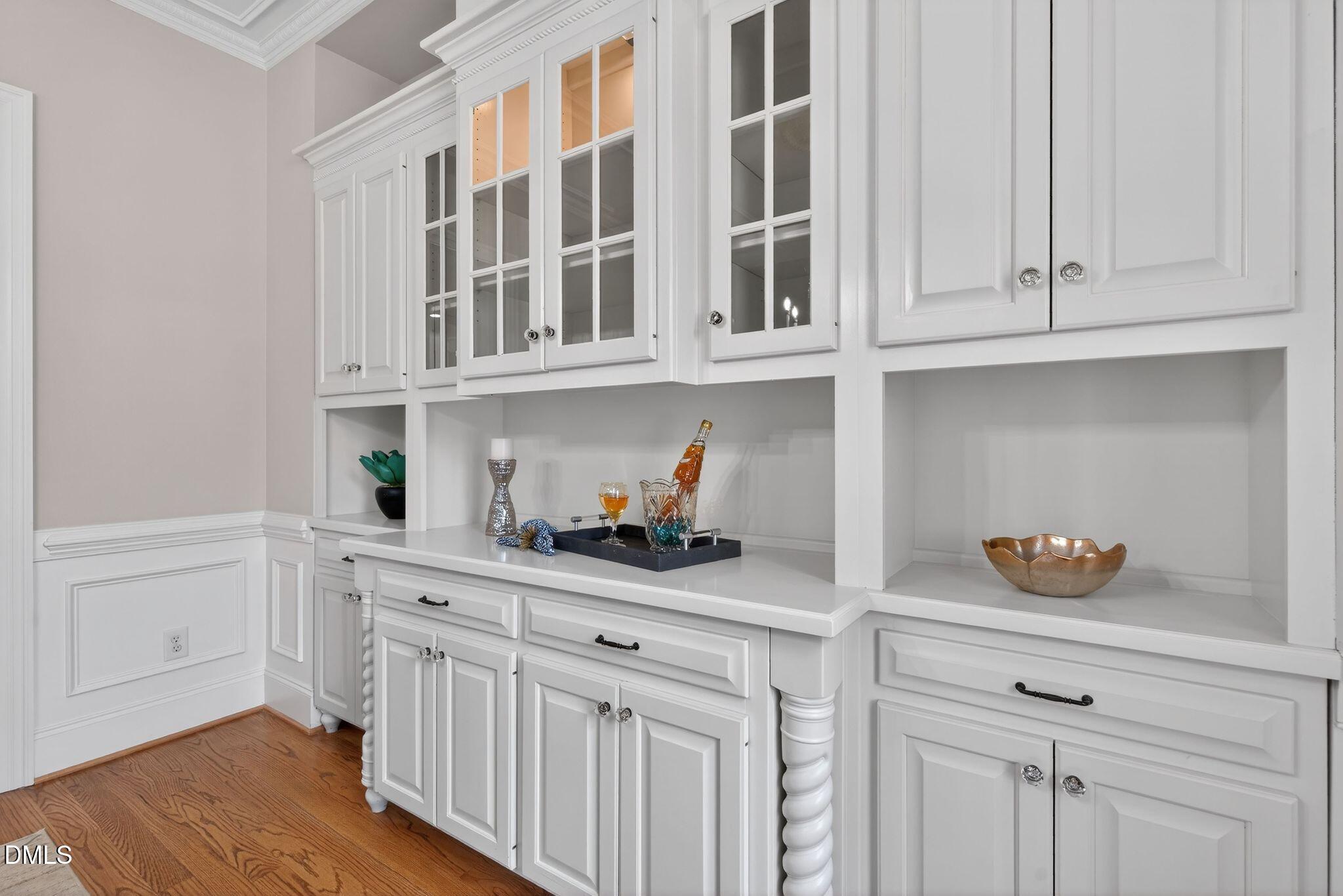 1609 Holland Road Fuquay-Varina, NC 27526 - Photo 25 of 79 a kitchen with white cabinets and sink