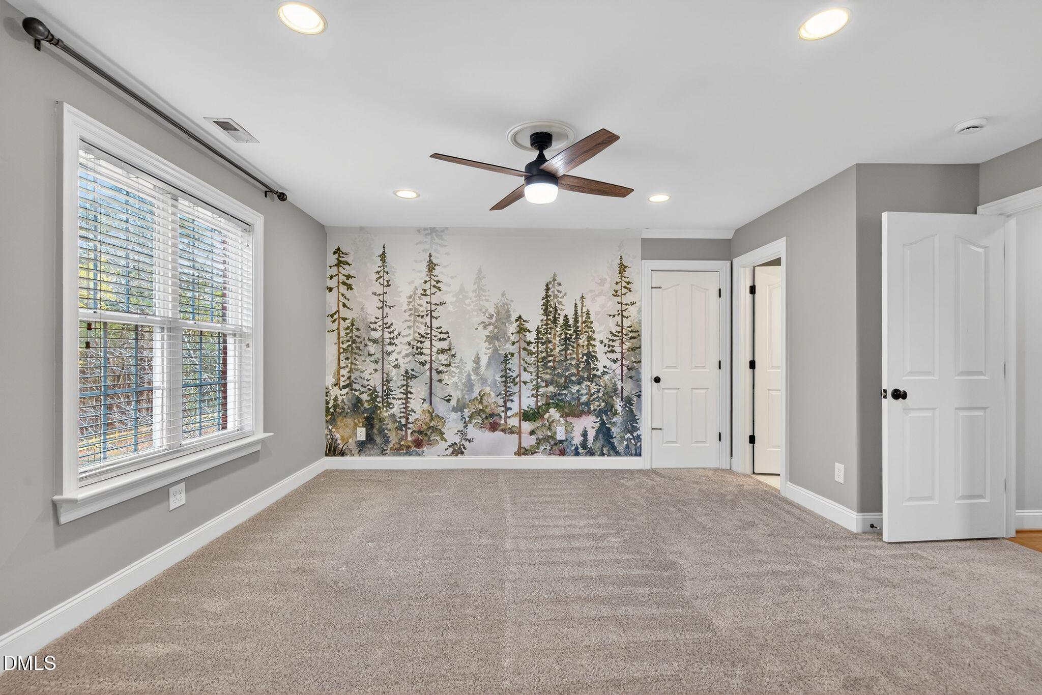 1609 Holland Road Fuquay-Varina, NC 27526 - Photo 47 of 79 a view of an empty room with a window and cabinet