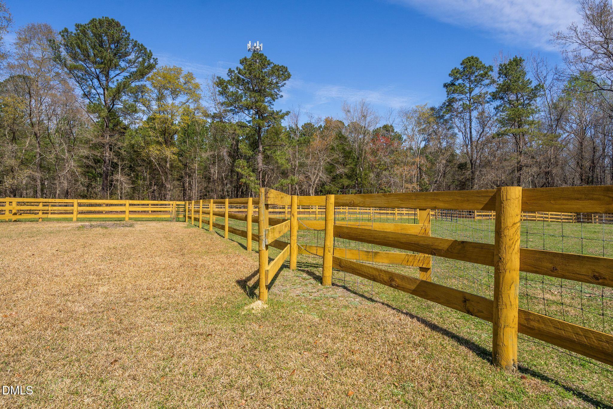 1609 Holland Road Fuquay-Varina, NC 27526 - Photo 51 of 79 a view of a garden with an outdoor space