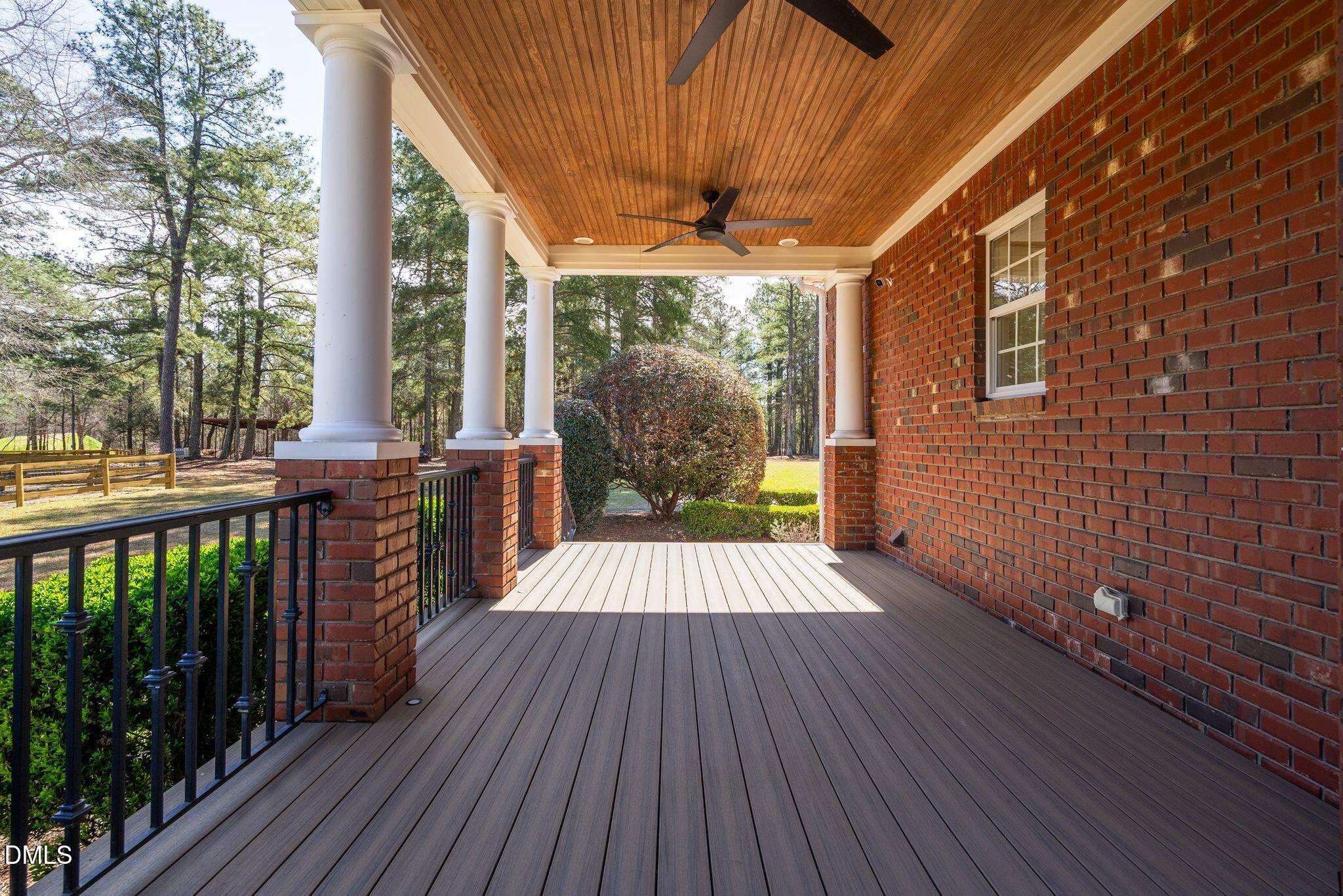 1609 Holland Road Fuquay-Varina, NC 27526 - Photo 54 of 79 a view of outdoor space with wooden floor and outdoor seating