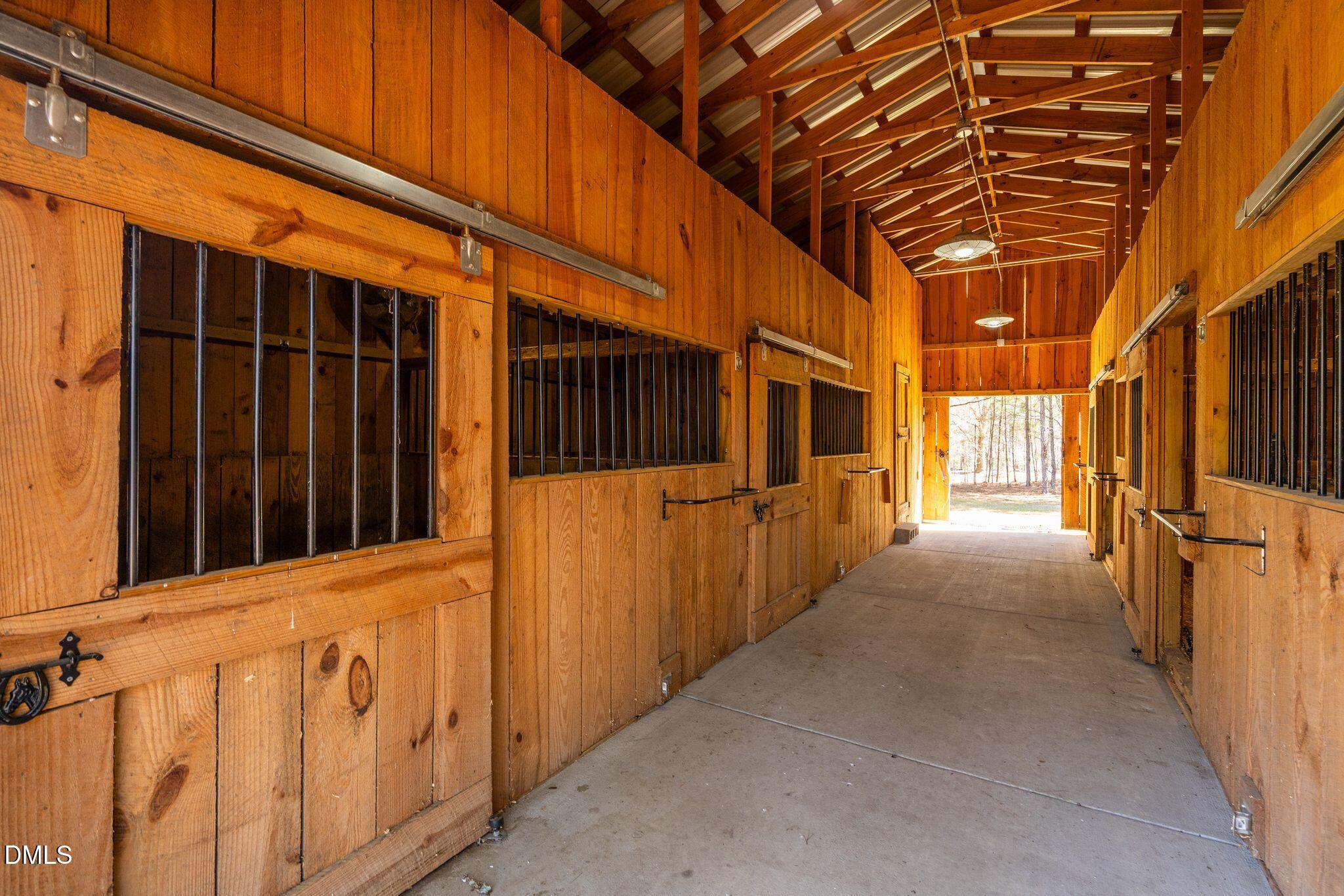 1609 Holland Road Fuquay-Varina, NC 27526 - Photo 60 of 79 a view of a pathway along the building