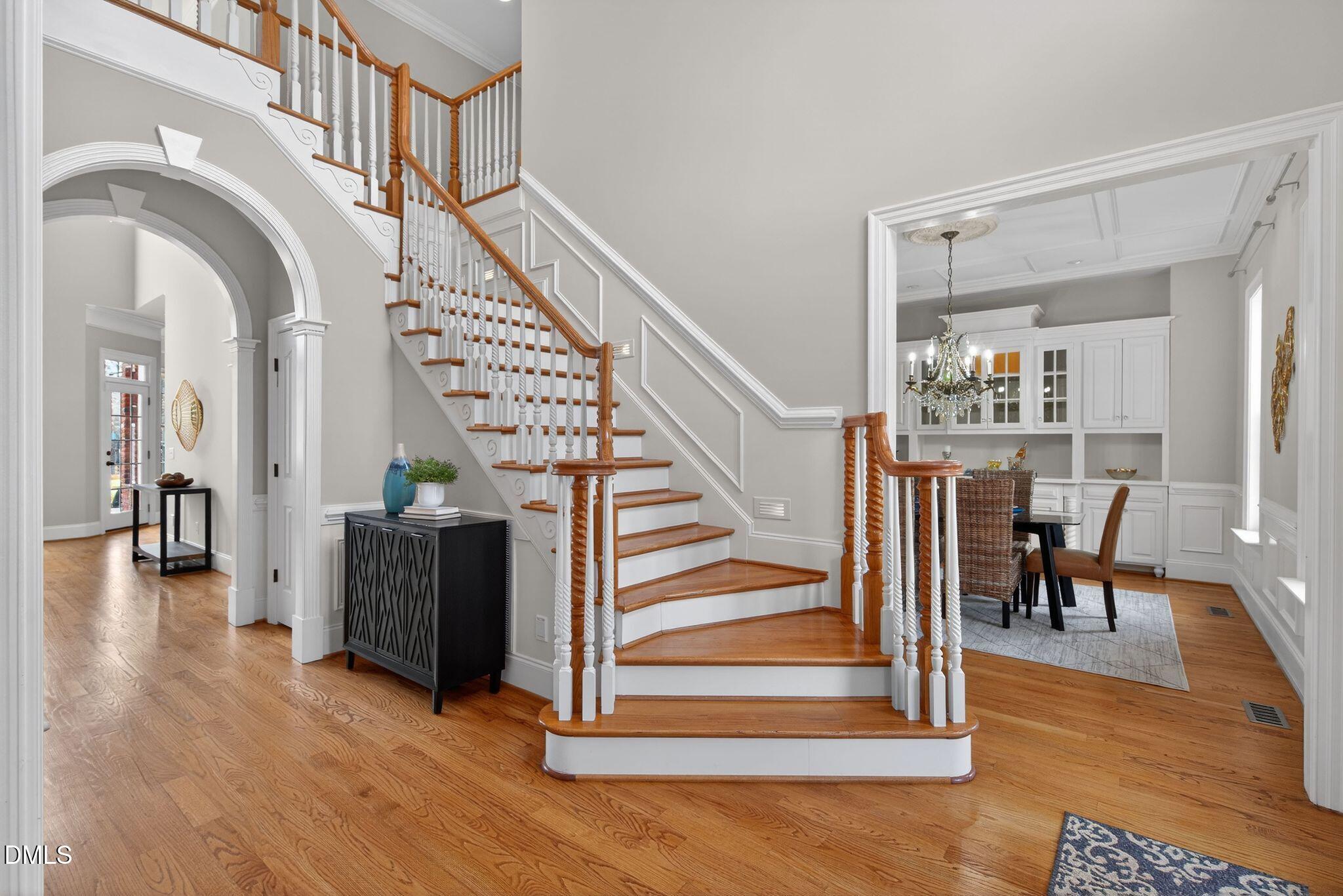 1609 Holland Road Fuquay-Varina, NC 27526 - Photo 6 of 79 a view of entryway and hall with wooden floor