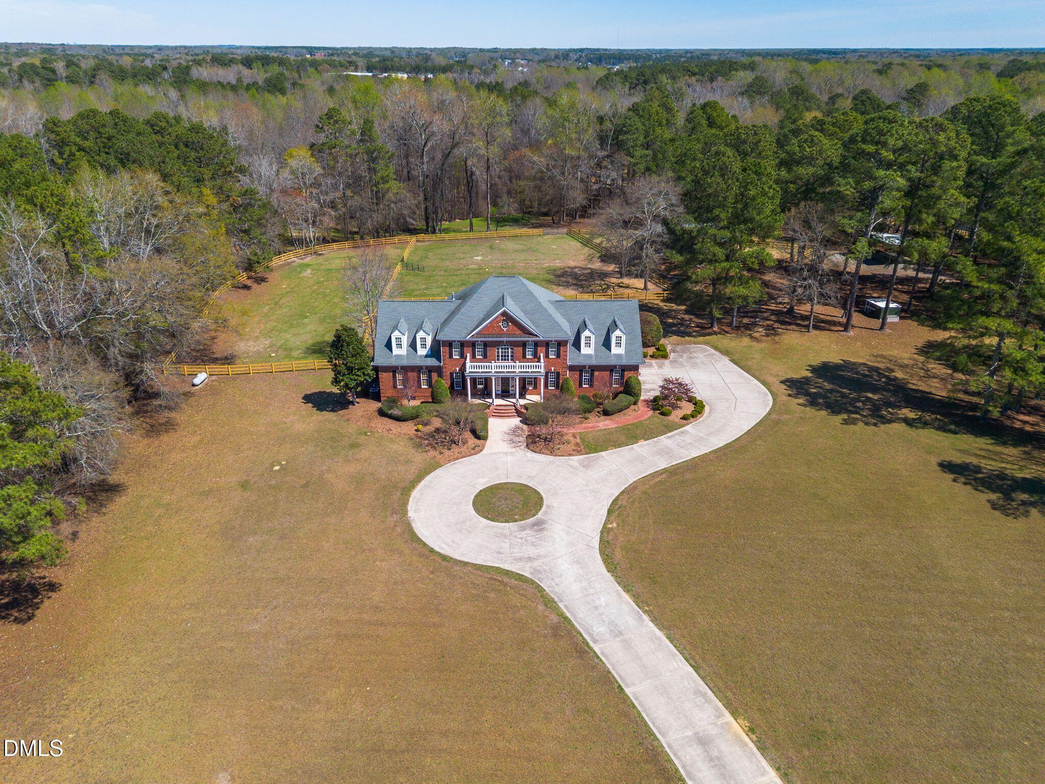1609 Holland Road Fuquay-Varina, NC 27526 - Photo 72 of 79 a view of a swimming pool with chairs