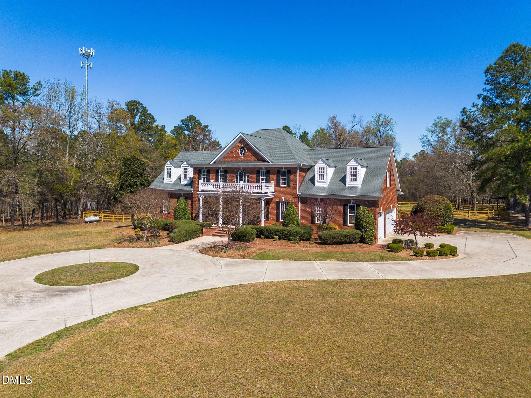 1609 Holland Road Fuquay-Varina, NC 27526 - Photo 73 of 79 a view of a house with swimming pool and sitting area