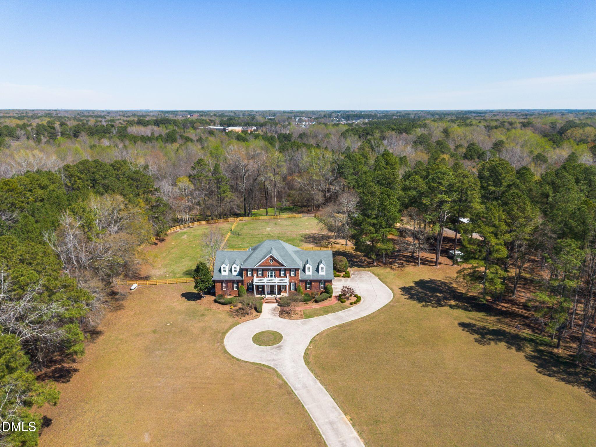 1609 Holland Road Fuquay-Varina, NC 27526 - Photo 75 of 79 a view of a swimming pool and lake view