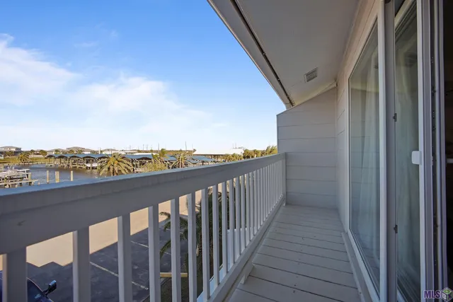 $235,000 | 411 Admiral Craik Drive, Unit 20, Grand Isle, LA 70358