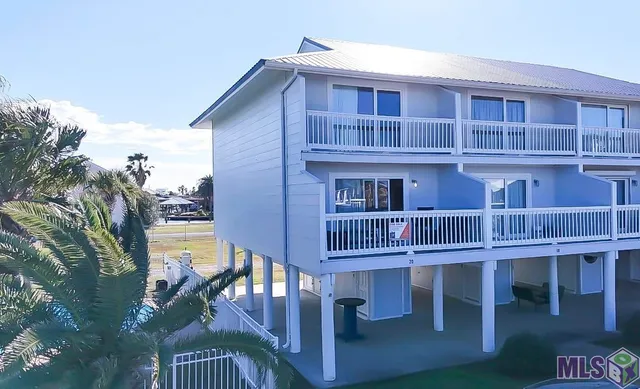 $235,000 | 411 Admiral Craik Drive, Unit 20, Grand Isle, LA 70358