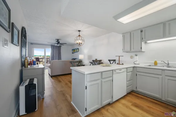 $228,500 | 411 Admiral Craik Drive, Unit 20, Grand Isle, LA 70358
