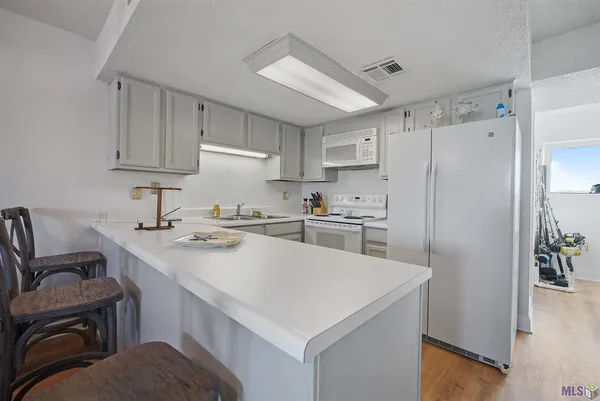 $228,500 | 411 Admiral Craik Drive, Unit 20, Grand Isle, LA 70358
