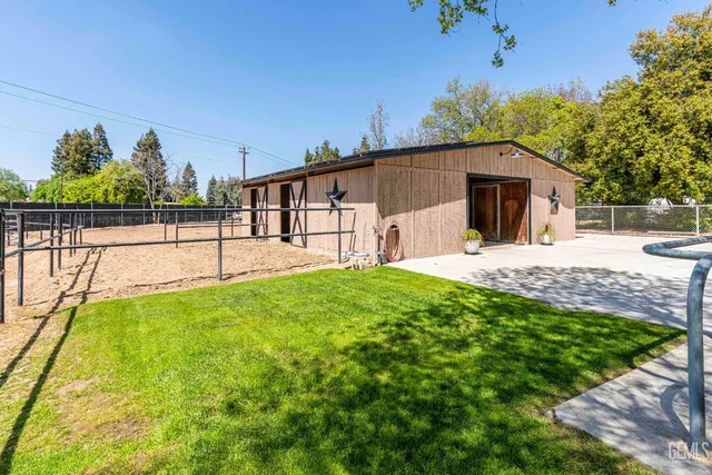 a view of a backyard with a garden