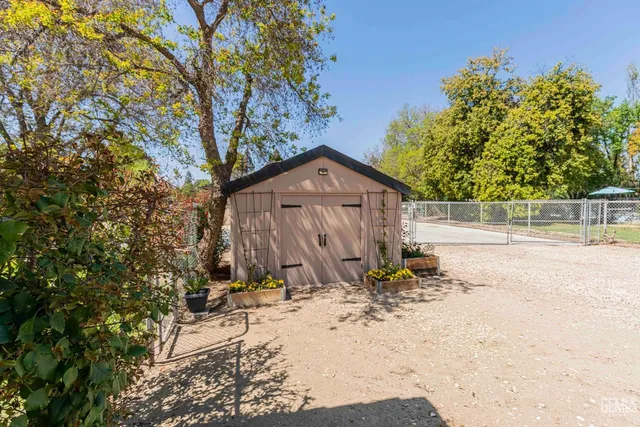 a view of a yard with an outdoor space