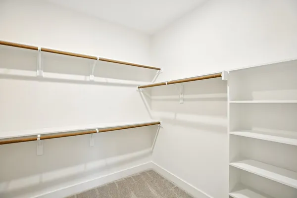 a view of an empty walk in closet